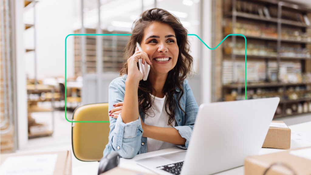 Woman smiling while talking on mobile device